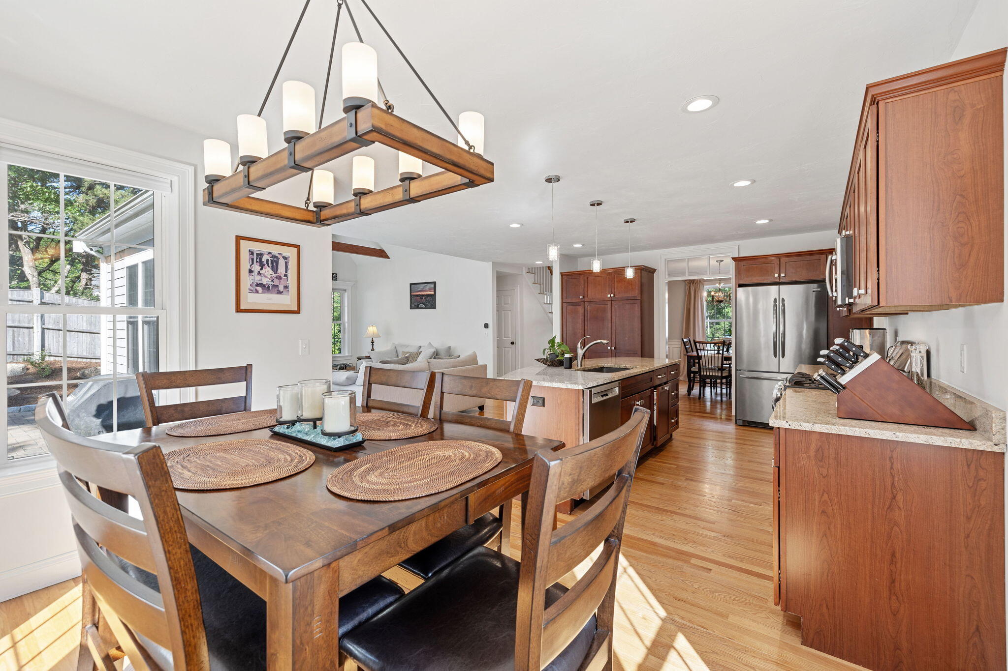 48 Meadowbrook Road Mashpee, MA 02649 - Photo 10 of 52 a view of a dining room with furniture and a chandelier