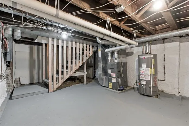 a view of an empty room with wooden walls