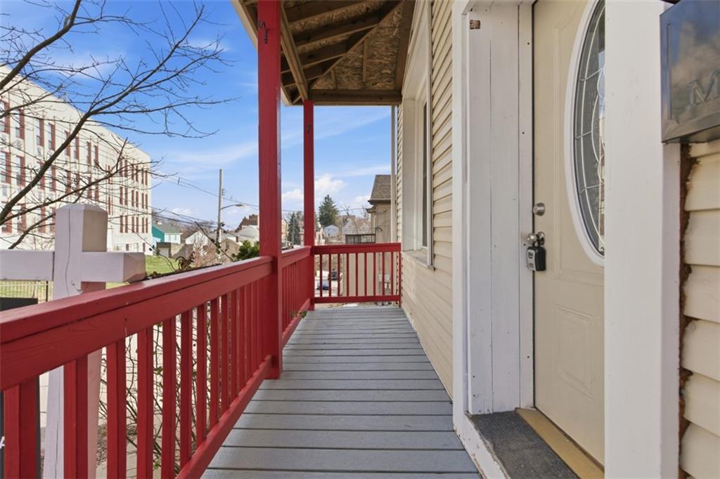 42 Cowan Street Pittsburgh, PA 15211 - Photo 3 of 27 a view of a balcony with wooden floor