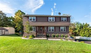 131 Pine Tree Road Monroe, NY 10950 - Photo 1 of 1 a front view of a house with garden
