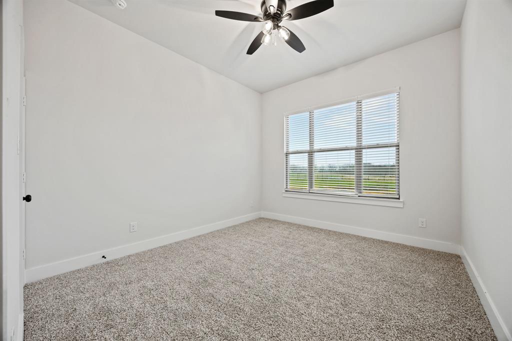 13721 Cash Mill Road Sanger, TX 76266 - Photo 20 of 28 a view of an empty room with a window