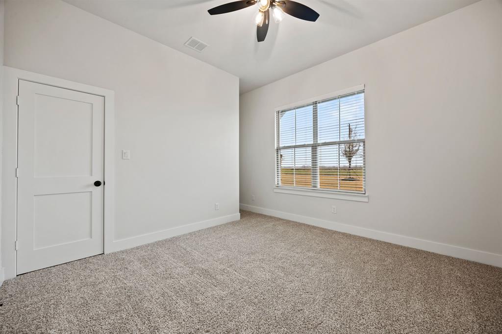 13721 Cash Mill Road Sanger, TX 76266 - Photo 21 of 28 a view of an empty room with a window