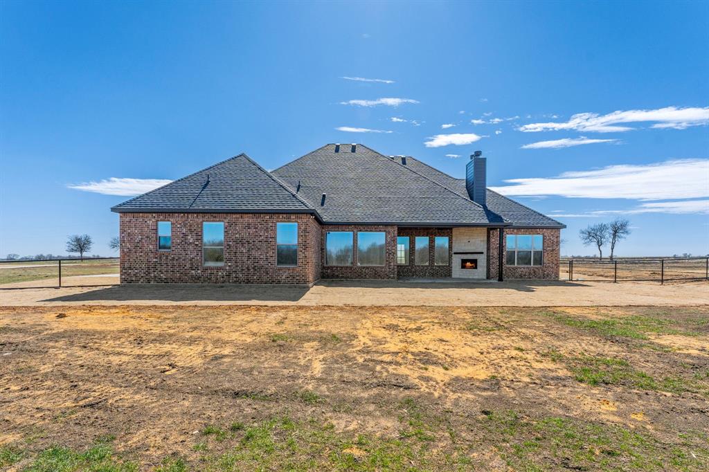 13721 Cash Mill Road Sanger, TX 76266 - Photo 25 of 28 a front view of a house with a yard