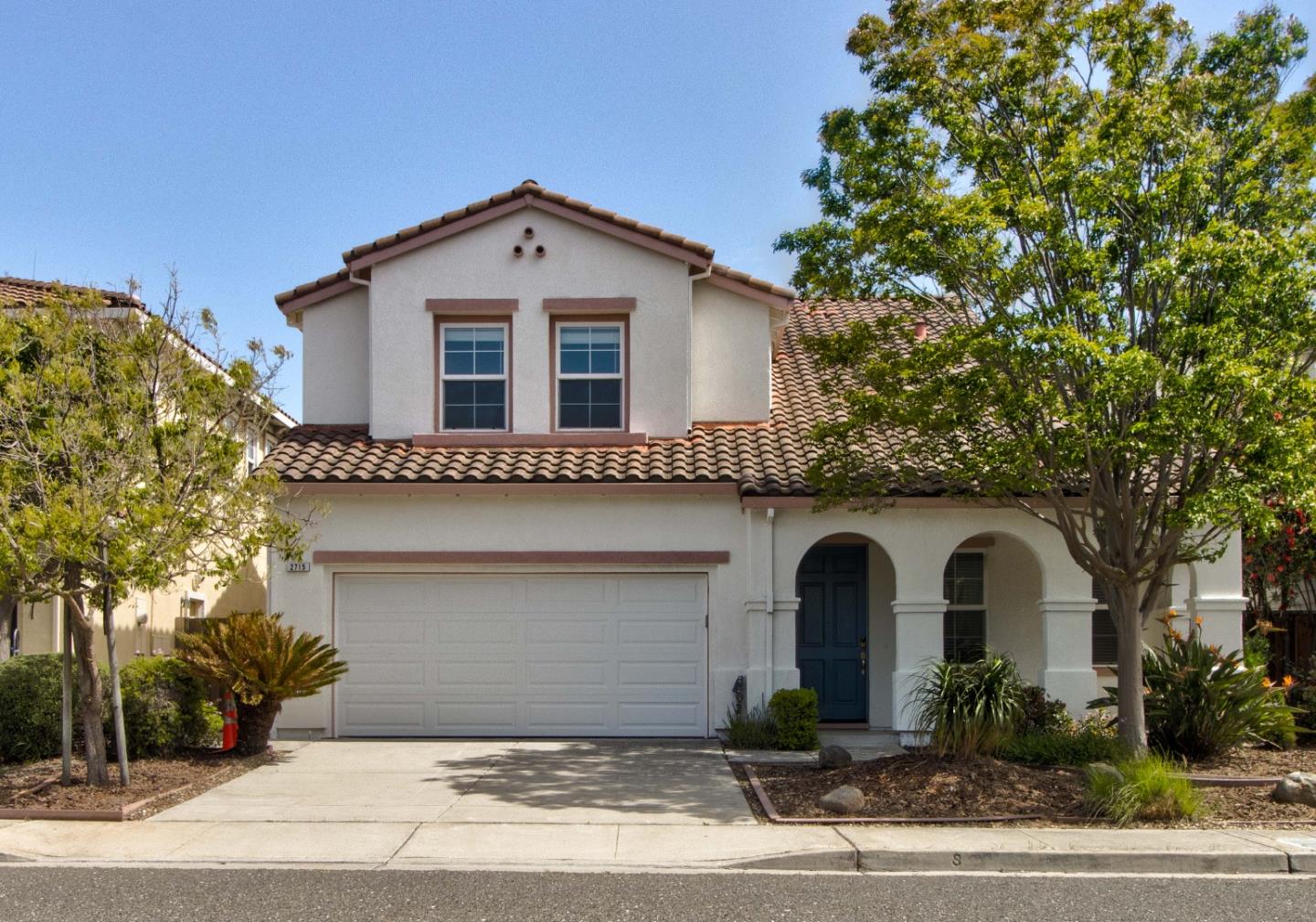 2715 Shellgate Circle Hayward, CA 94545 - Photo 1 of 47 a front view of a house with a garden