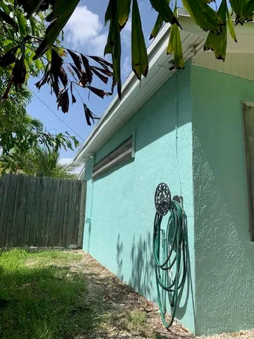 a view of a backyard of a house