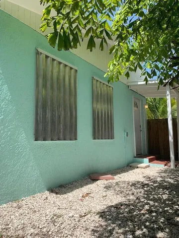 a view of a backyard of a house