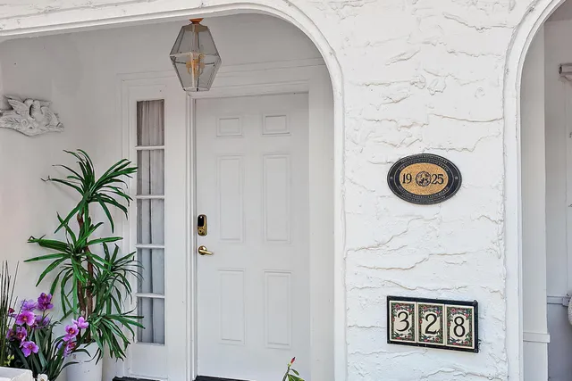 a view of door with a potted plant