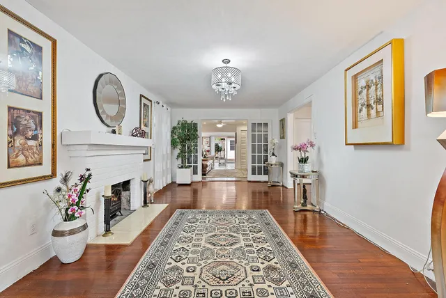 a very nice looking dining room with a large window