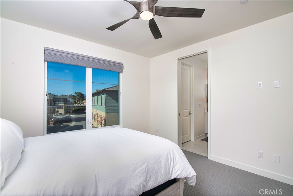 1523 Doheny Way Dana Point, CA 92629 - Photo 14 of 26 a bedroom with a bed and a large closet