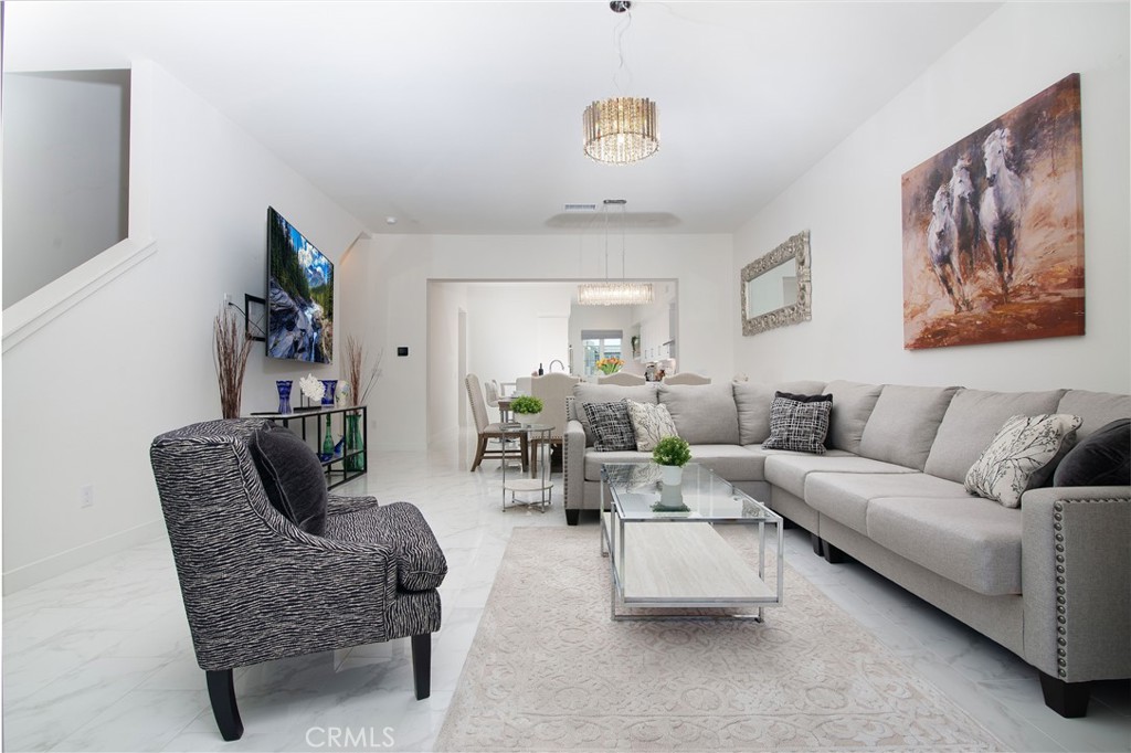 1523 Doheny Way Dana Point, CA 92629 - Photo 15 of 26 a living room with furniture and painting on the wall
