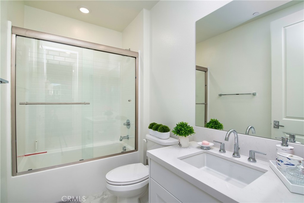 1523 Doheny Way Dana Point, CA 92629 - Photo 17 of 26 a bathroom with a sink toilet and shower