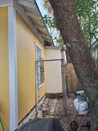 a view of a back yard of the house