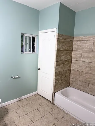 a bathroom with a bathtub