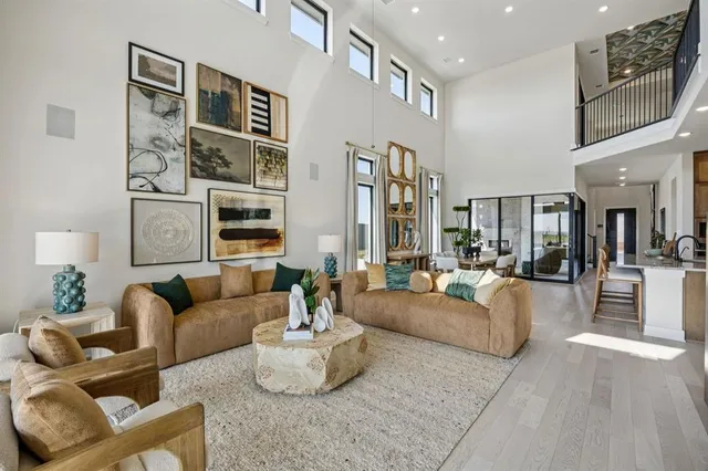 a living room with fireplace furniture and decor