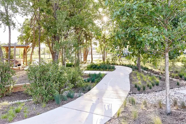 a view of backyard with green space