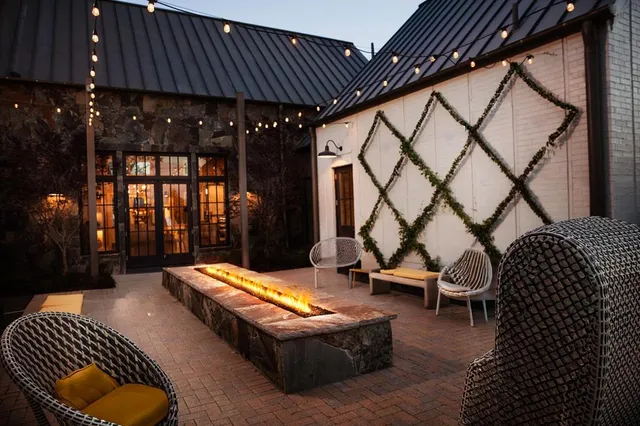 a outdoor space with patio furniture and potted plants