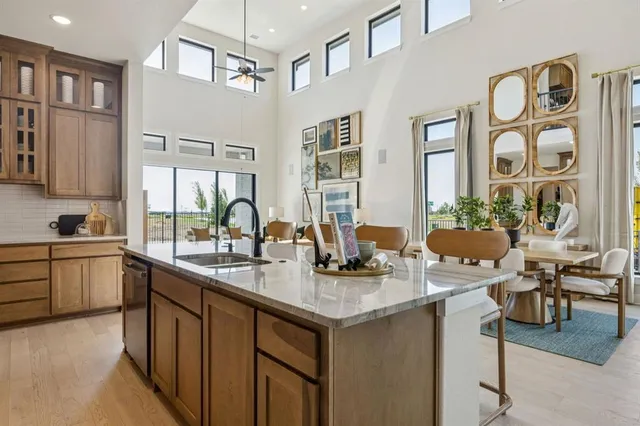 a kitchen with a sink cabinets and counter space