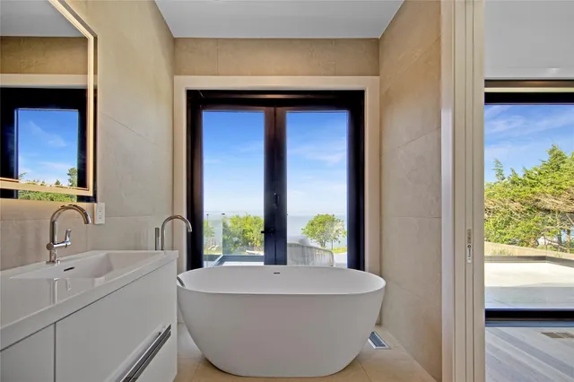 a bathroom with a sink and a bathtub