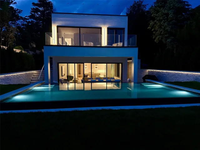 a view of house next to a yard