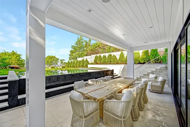 a view of an outdoor dining space with furniture