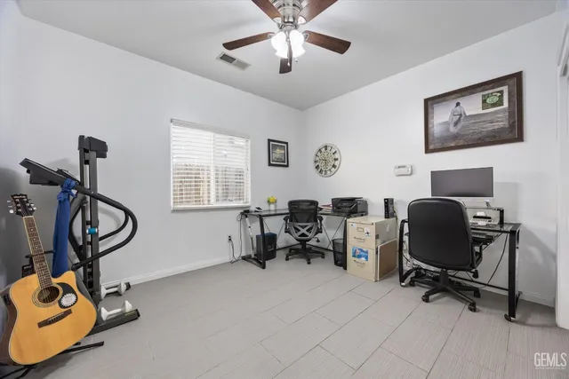 a view of a workspace with gym equipment