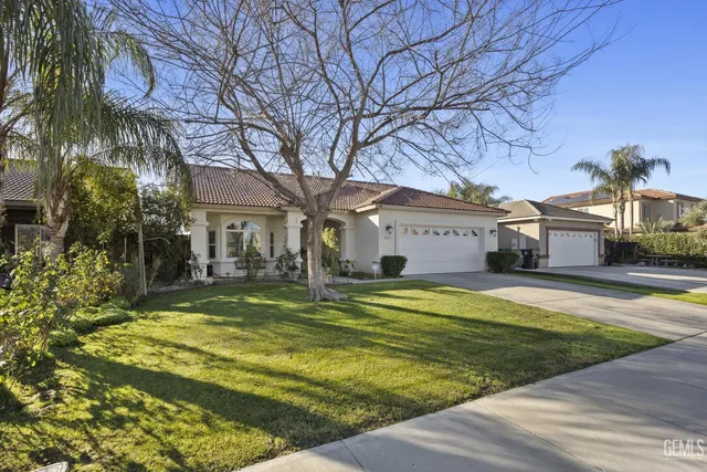 a view of a house with swimming pool