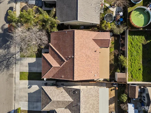 front view of a house with a tree