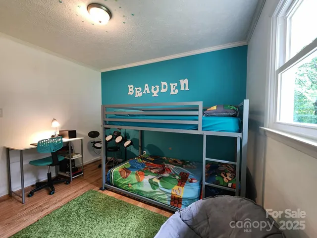 a room with toys and a dresser