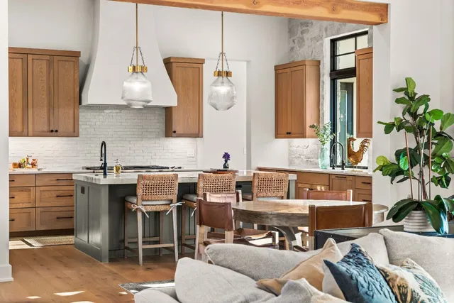 a kitchen with a sink and a stove