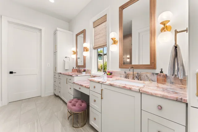 a bedroom with a bed and a potted plant