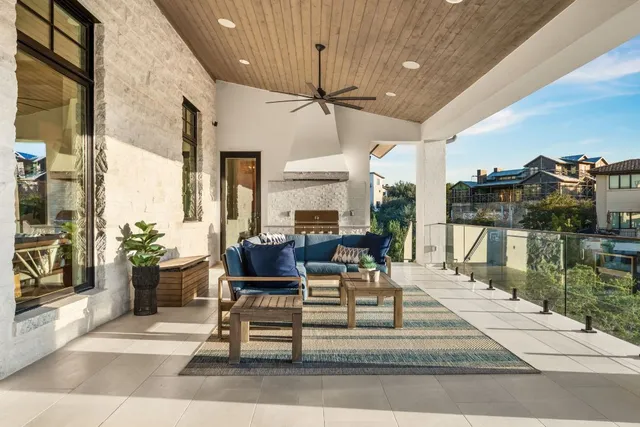 a living room with patio furniture