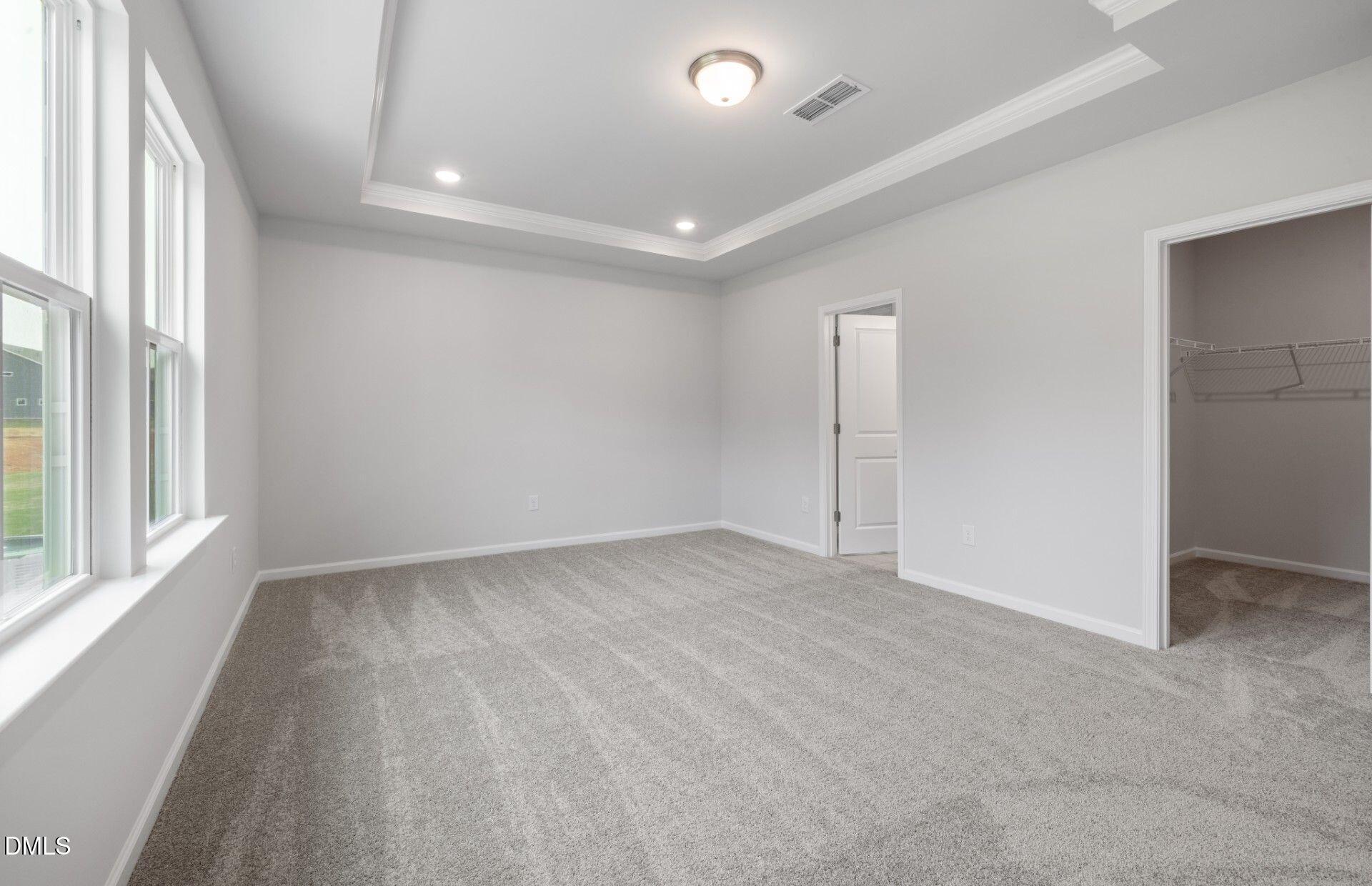 316 Broomside Avenue Raleigh, NC 27603 - Photo 11 of 31 an empty room with windows