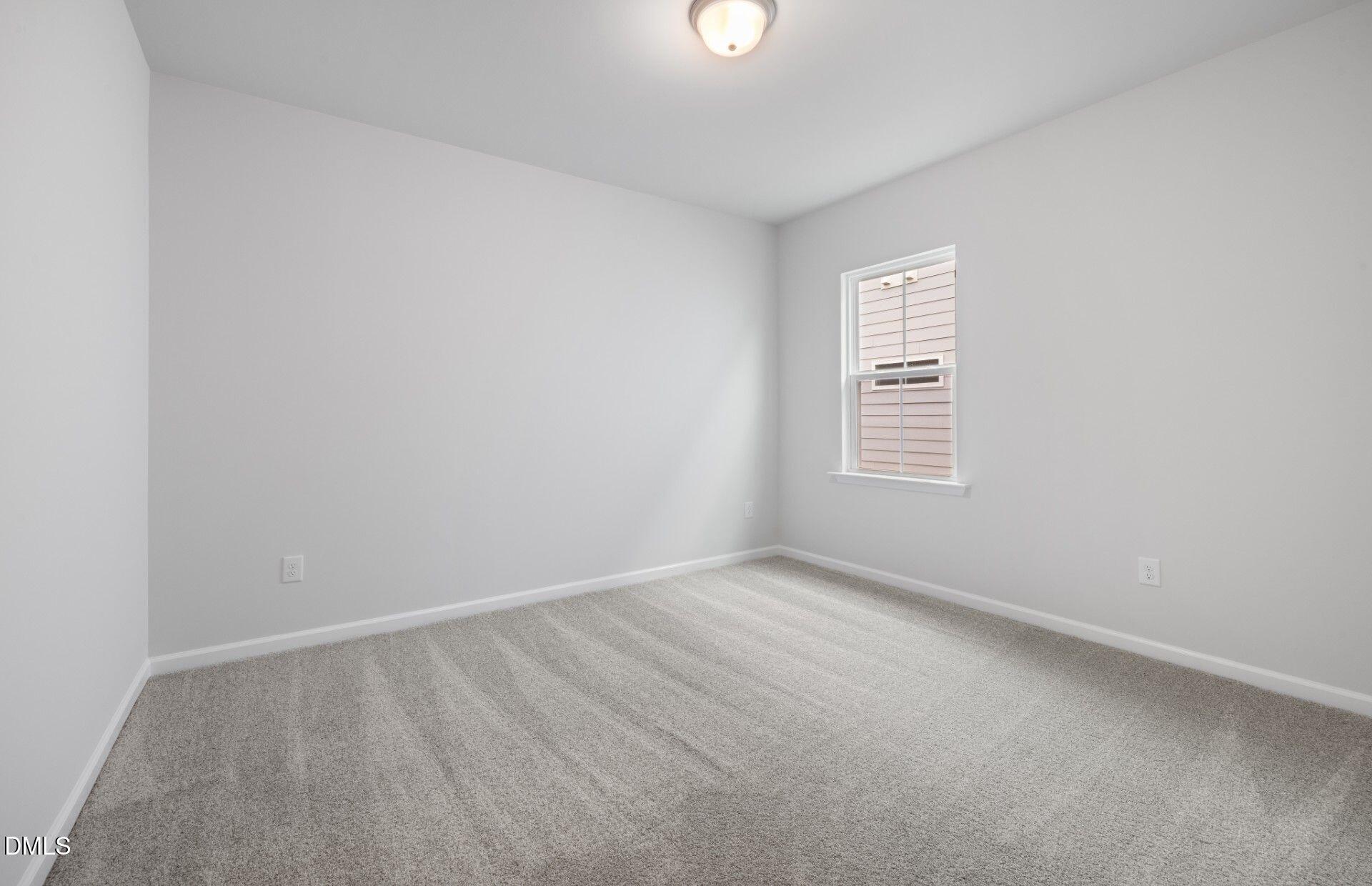 316 Broomside Avenue Raleigh, NC 27603 - Photo 15 of 31 an empty room with a window