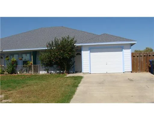 a black and white photo of a house