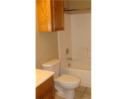 4202 Easy Street, Unit B Corpus Christi, TX 78418 - Photo 9 of 10 a bathroom with a toilet and a shower