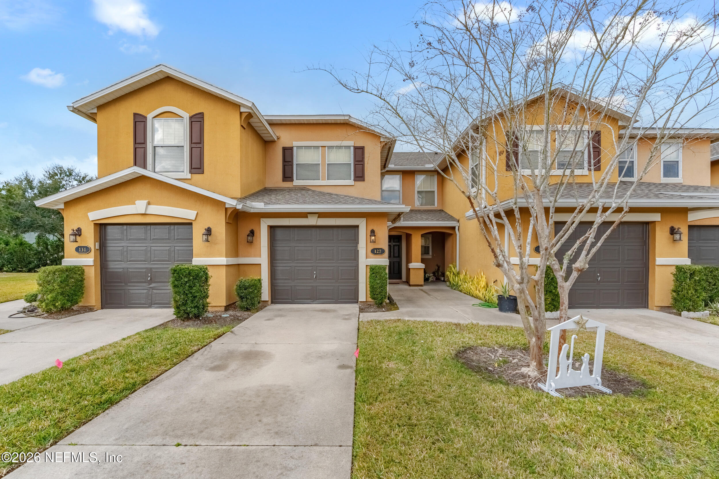 127 Crete Court St. Augustine, FL 32084 - Photo 2 of 33 a front view of a house with garden