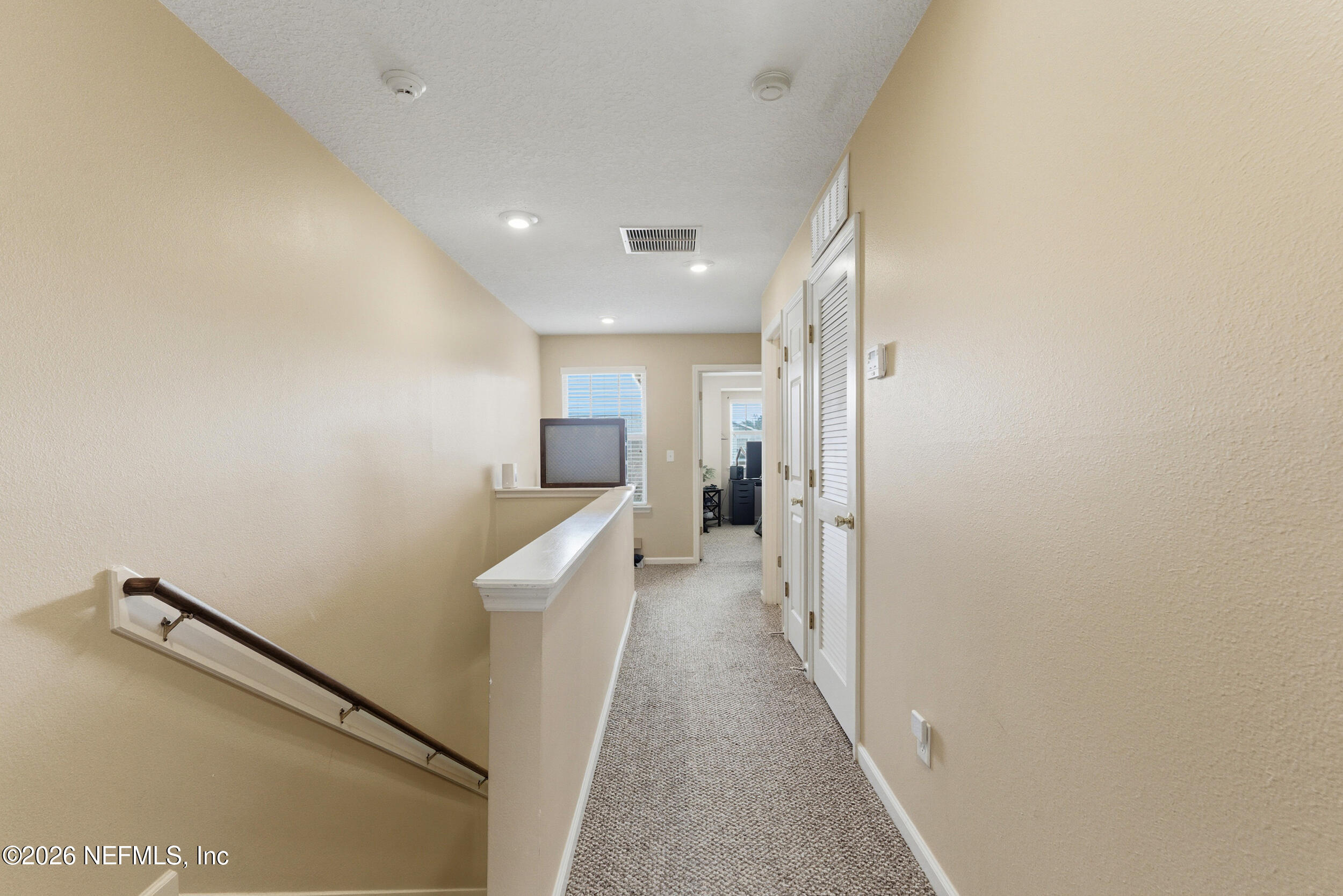 127 Crete Court St. Augustine, FL 32084 - Photo 22 of 33 a view of hallway with stairs
