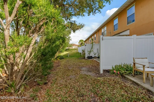 a front view of a house with swimming pool