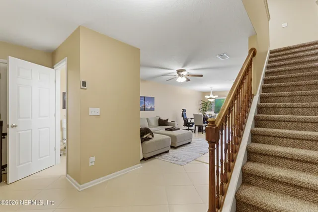 a view of entryway and workspace