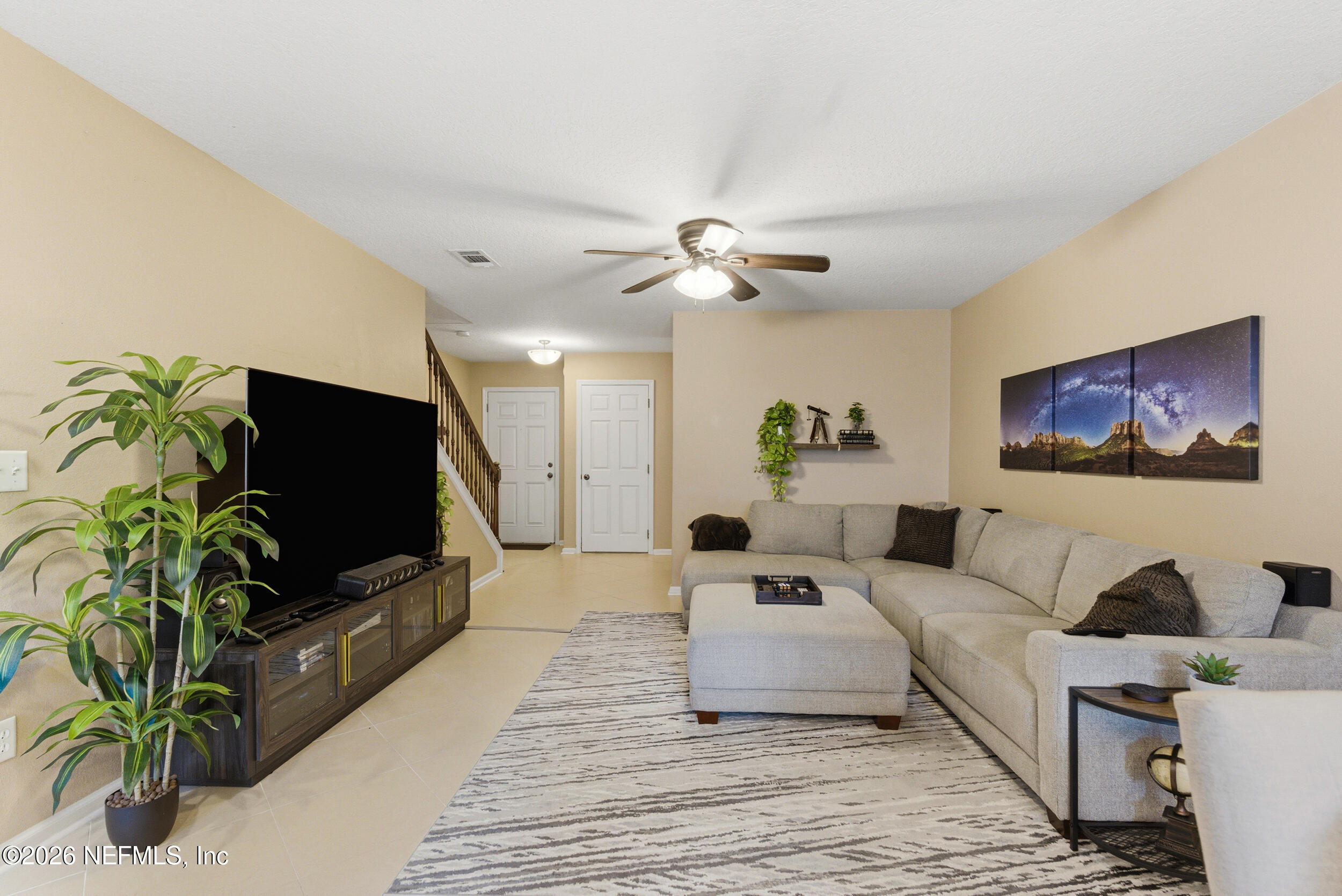 127 Crete Court St. Augustine, FL 32084 - Photo 8 of 33 a living room with furniture and a flat screen tv