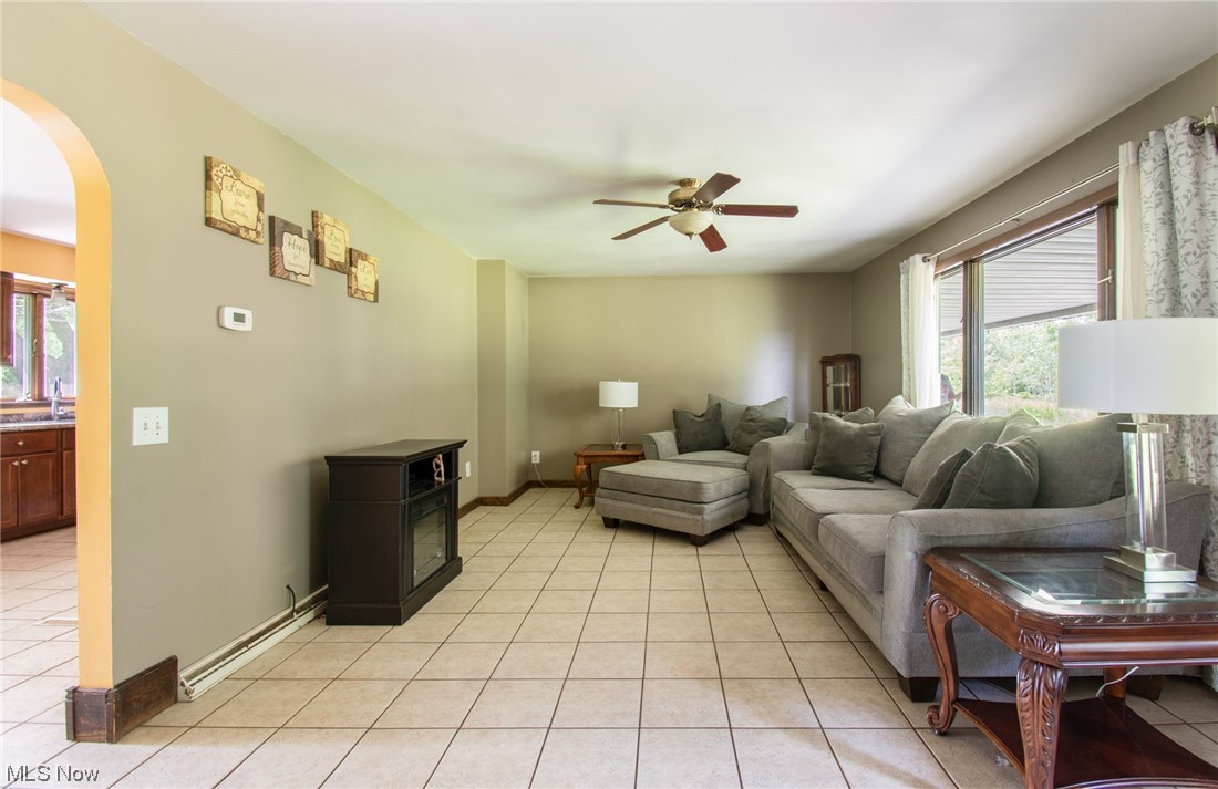 11730 Cook Road Canfield, OH 44406 - Photo 6 of 35 Large, bright living room at front of home