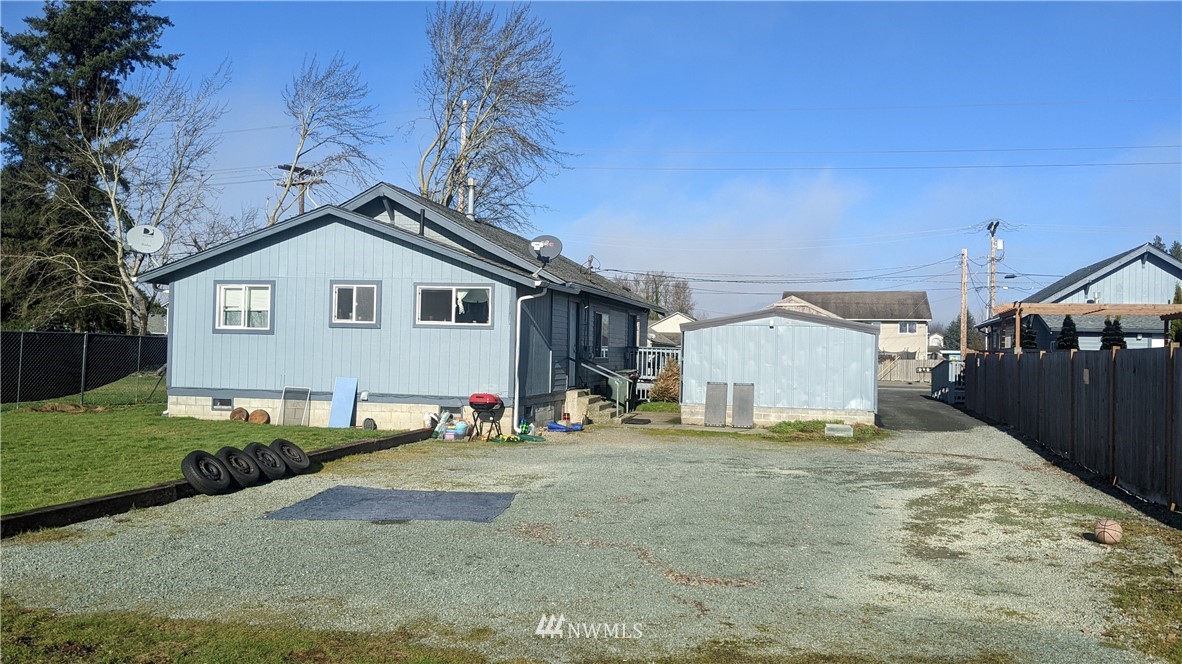 829 Cook Road Sedro-Woolley, WA 98284 - Photo 6 of 8 a front view of a house with a yard