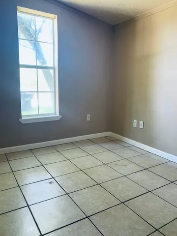 an empty room and a window