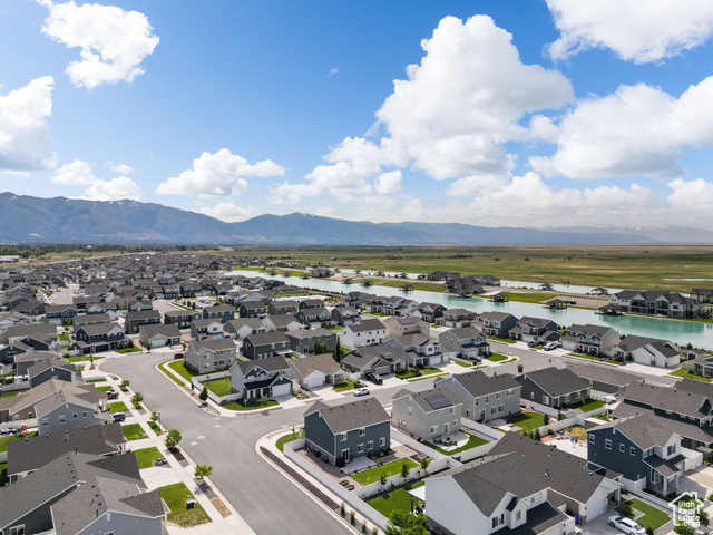 3456 South Linden Way Syracuse, UT 84075 - Photo 41 of 50 Aerial perspective of suburban area with a water and mountain view
