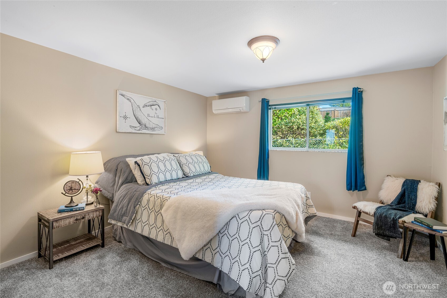 9537 South 213th Street Kent, WA 98031 - Photo 15 of 31 a bedroom with a bed and a couch