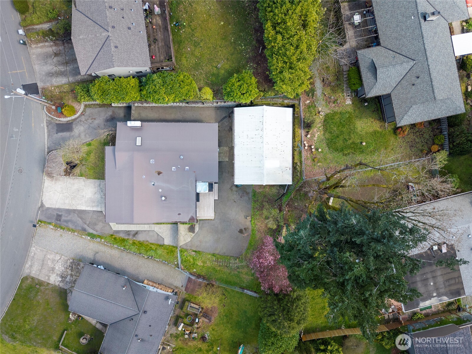 9537 South 213th Street Kent, WA 98031 - Photo 27 of 31 an aerial view of a house with a garden and a yard