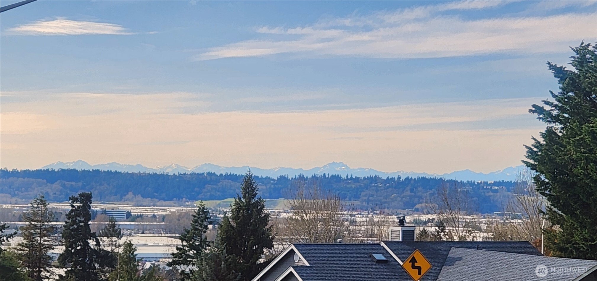 9537 South 213th Street Kent, WA 98031 - Photo 30 of 31 a view of a city with sunset view