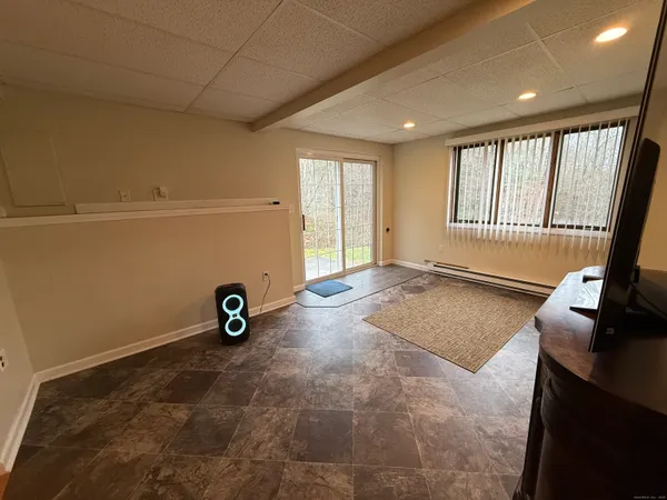 a view of an empty room with a window