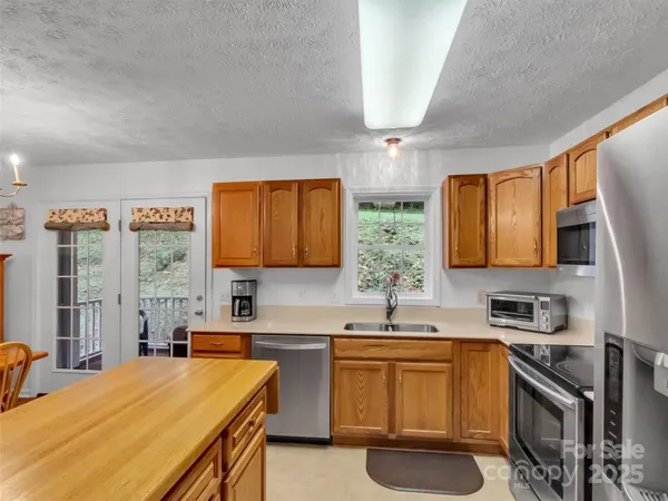 a bedroom with a bed and a table in it