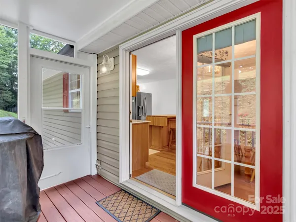 a view of a two chairs in the deck